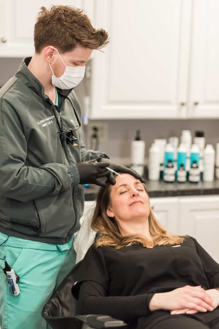 Dr. Elliot Humiston doing Tox injections on a client at Taylor Drive Facial Aesthetics in Sheboygan, WI. 